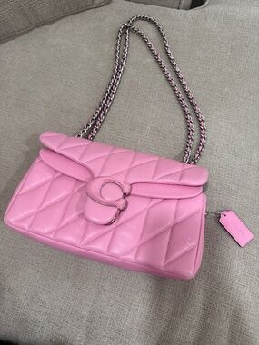 Pink quilted coach bag
